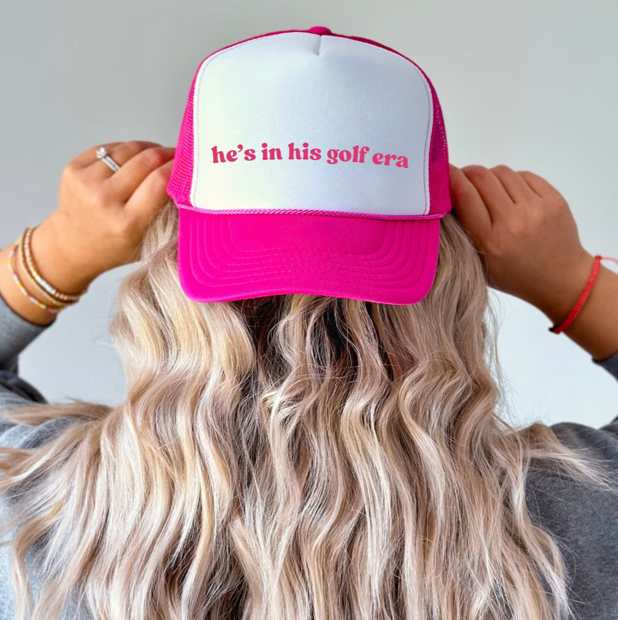 He's In His Golf Era Trucker Hat