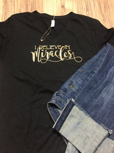 I believe in miracles v-neck slouchy tee